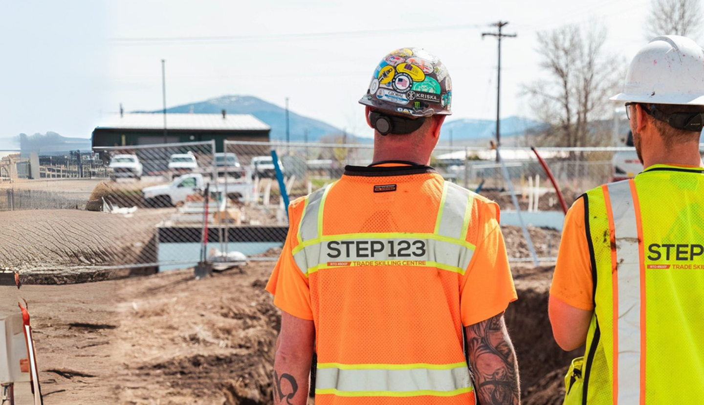 Step123 - 2 men standing next to each other